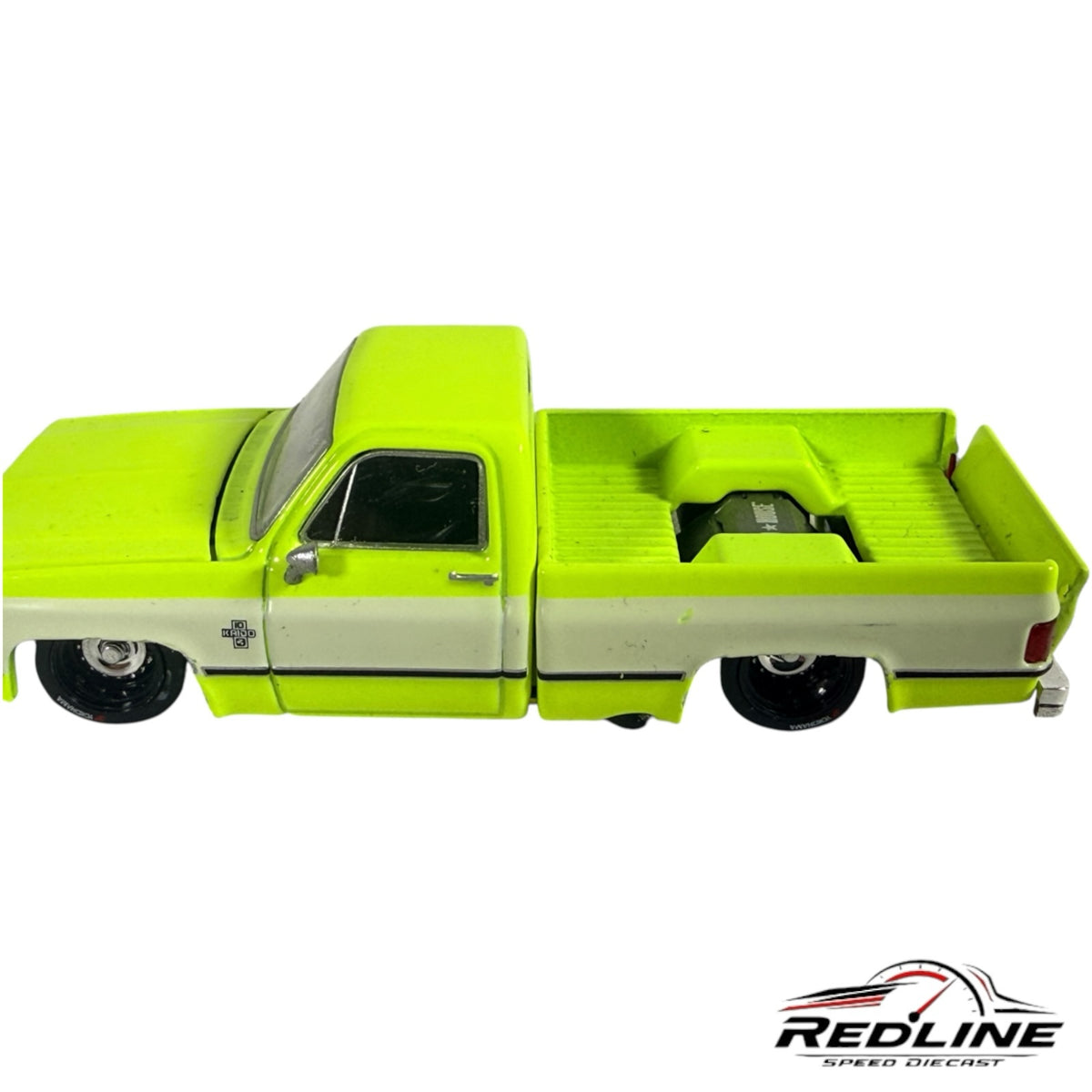 Redline Speed Diecast 1:64 scale 1983 Chevrolet Silverado in neon green and white with a slammed custom truck stance.