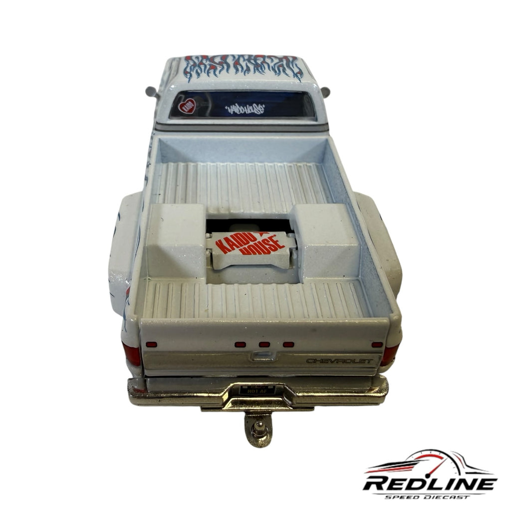 Redline Speed Diecast 1:64 scale white Chevrolet Silverado Dually truck bed with Kaido House branding and flame decals
