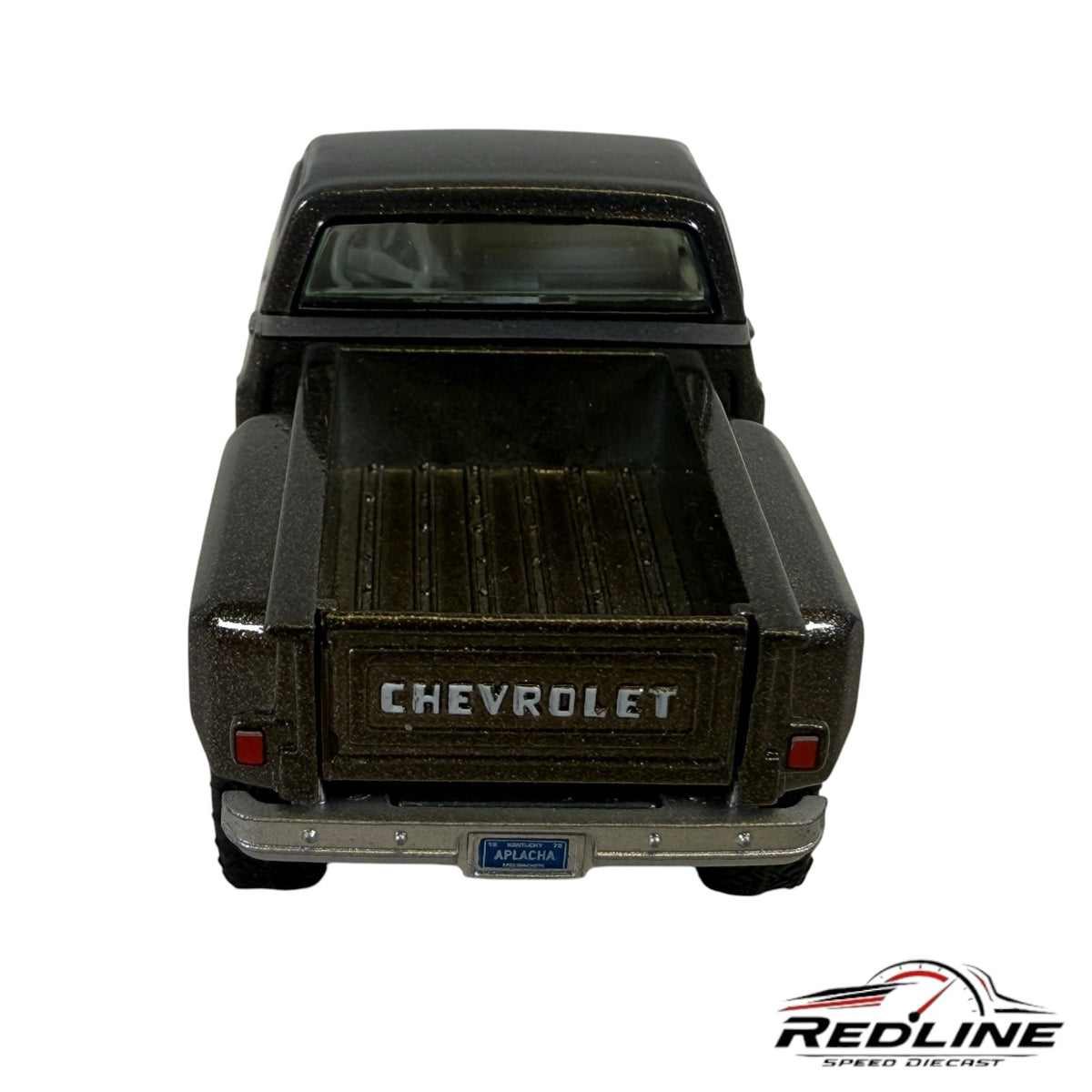 Redline Speed Diecast 1:64 scale metallic brown Chevrolet Silverado stepside pickup truck, rear view with chrome bumper