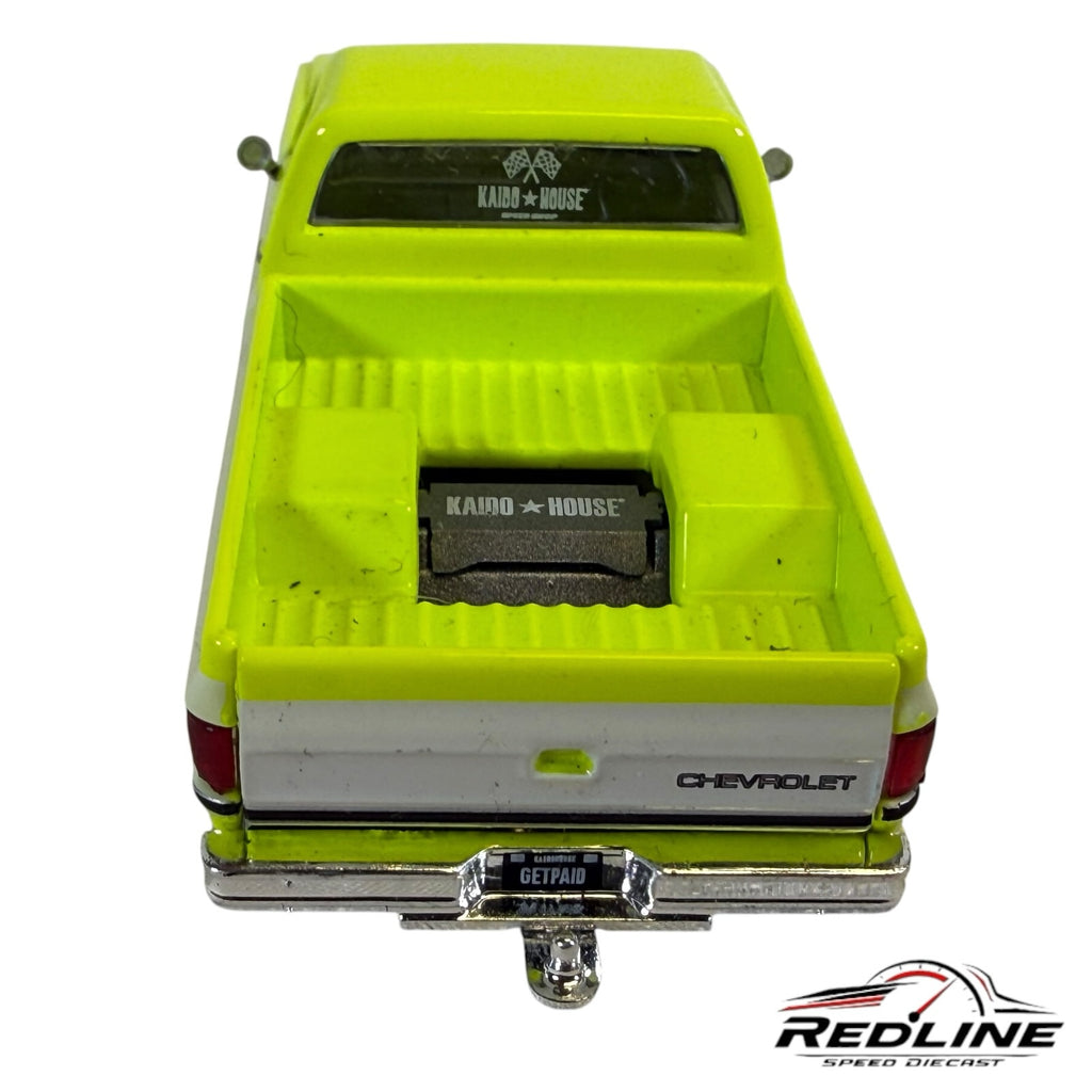 Redline Speed Diecast 1:64 scale Kaido House Mini GT Chevrolet Silverado truck in flo yellow, rear view
