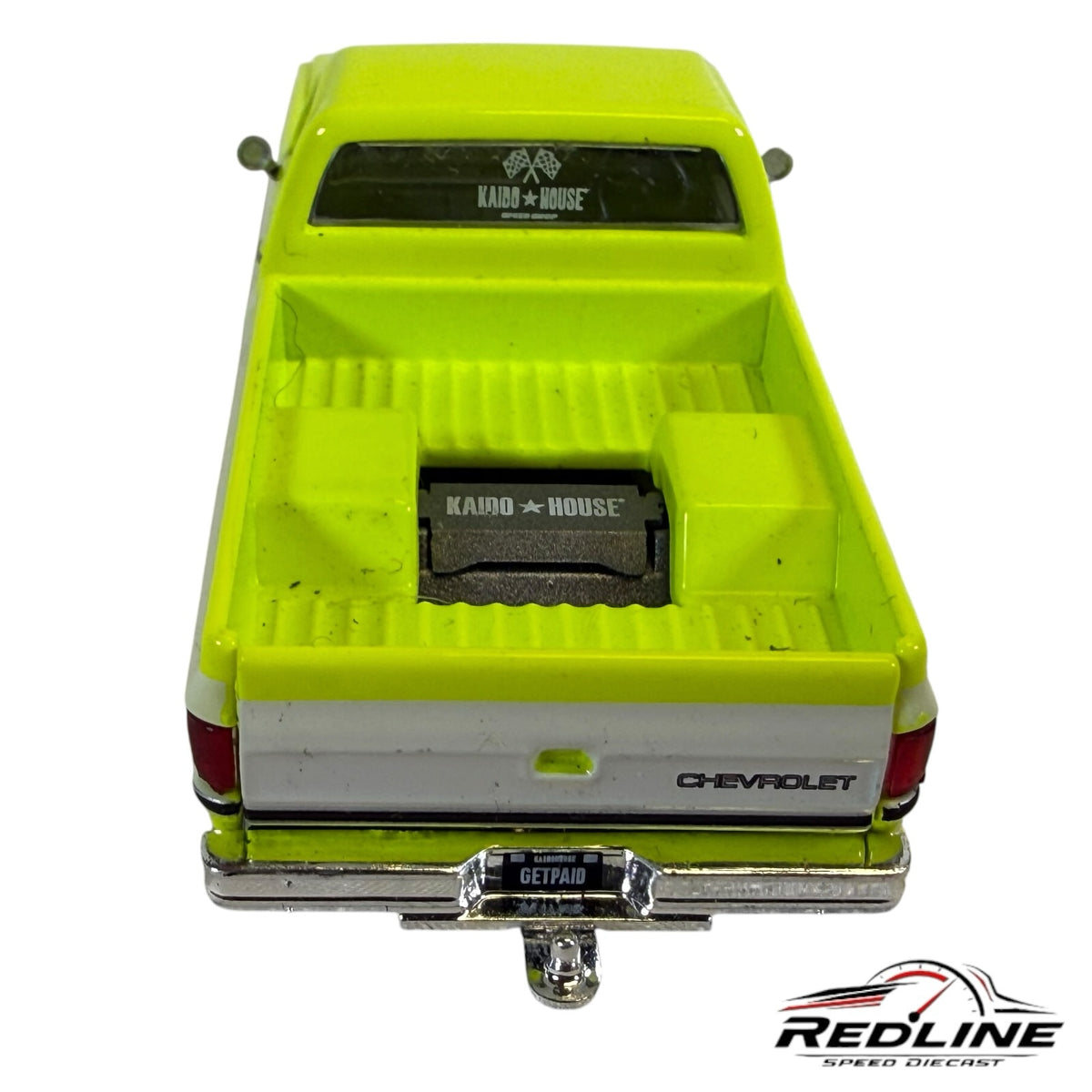 Redline Speed Diecast 1:64 scale Kaido House Mini GT Chevrolet Silverado truck in flo yellow, rear view