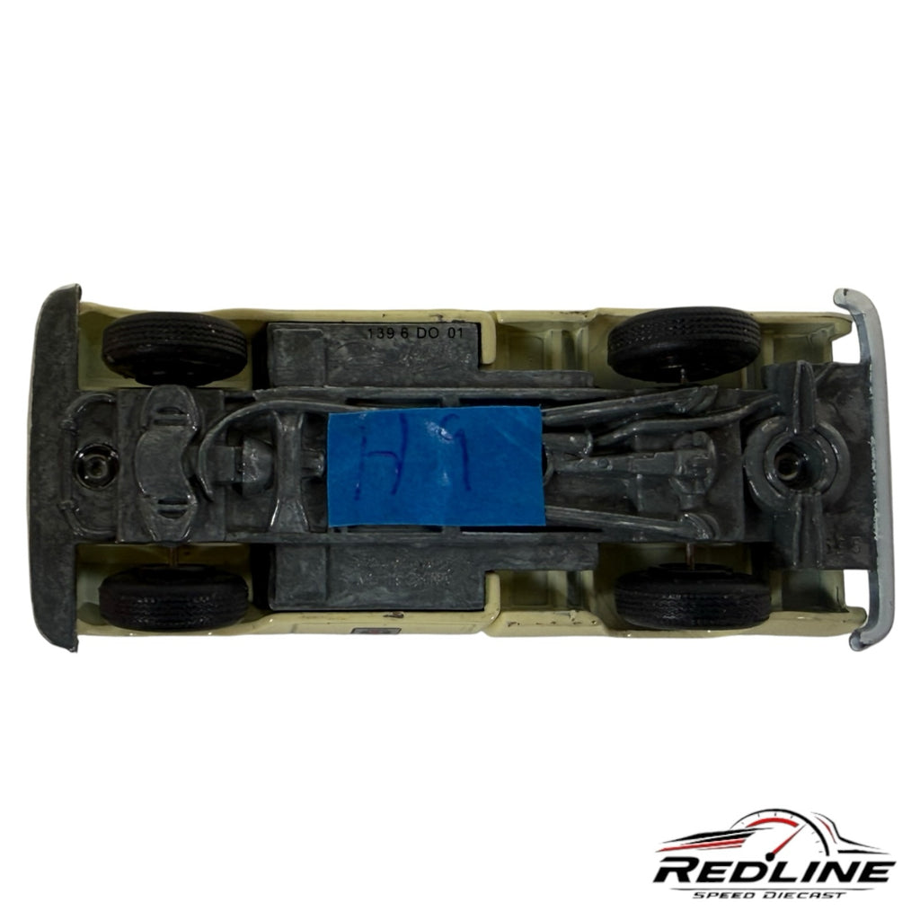 Underside view of a Redline Speed Diecast vintage Chevrolet pickup truck model showing chassis and wheel detail