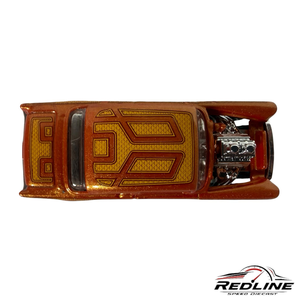 Top view of a Redline Speed Diecast 55 Chevy Bel Air Gasser in metallic copper-orange with gold geometric roof graphics