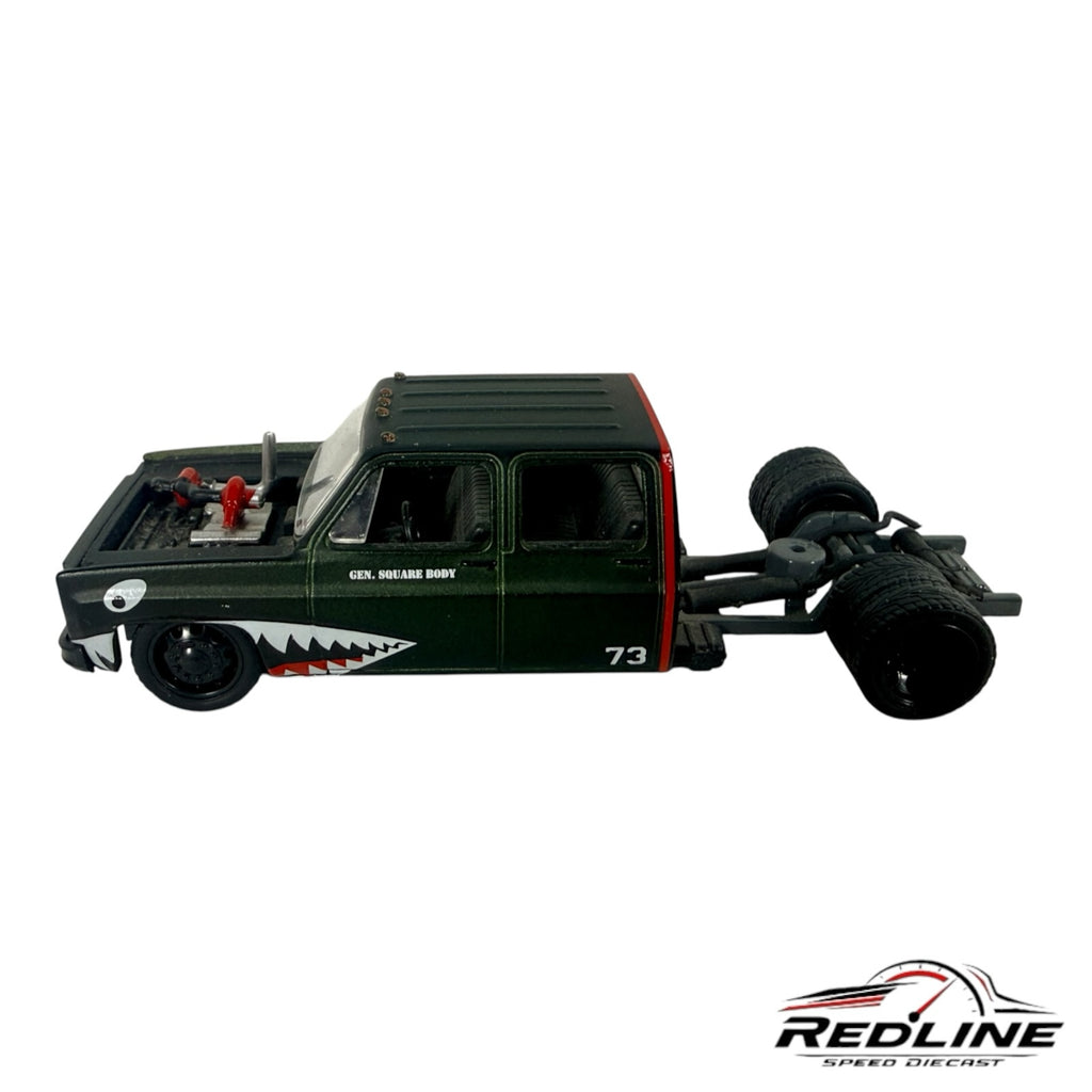 Redline Speed Diecast custom dark green square body pickup truck with shark-mouth graphics and dually rear axle.