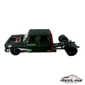 Redline Speed Diecast custom dark green square body pickup truck with shark-mouth graphics and dually rear axle.