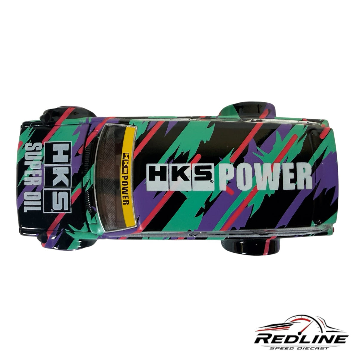 Redline Speed Diecast Kaido House Datsun 510 Wagon with HKS livery, top view showing black, purple, and green graphics.