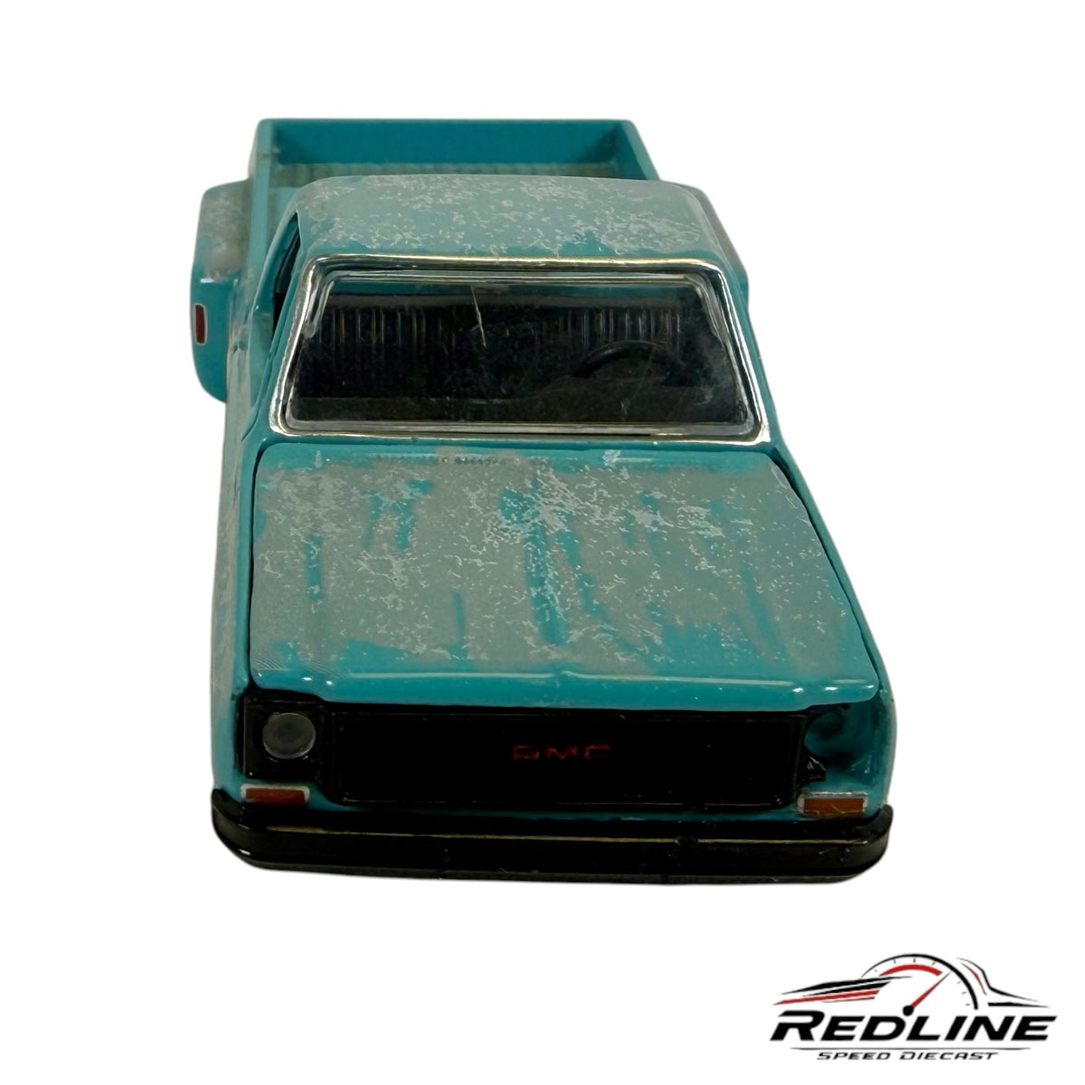 Redline Speed Diecast vintage teal and white distressed GMC pickup truck model, front view