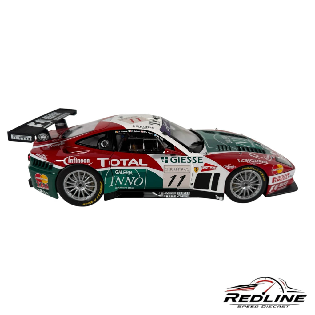 Redline Speed Diecast 1:18 scale Ferrari 575 GTC race car model in red, white, and green livery with sponsor decals.