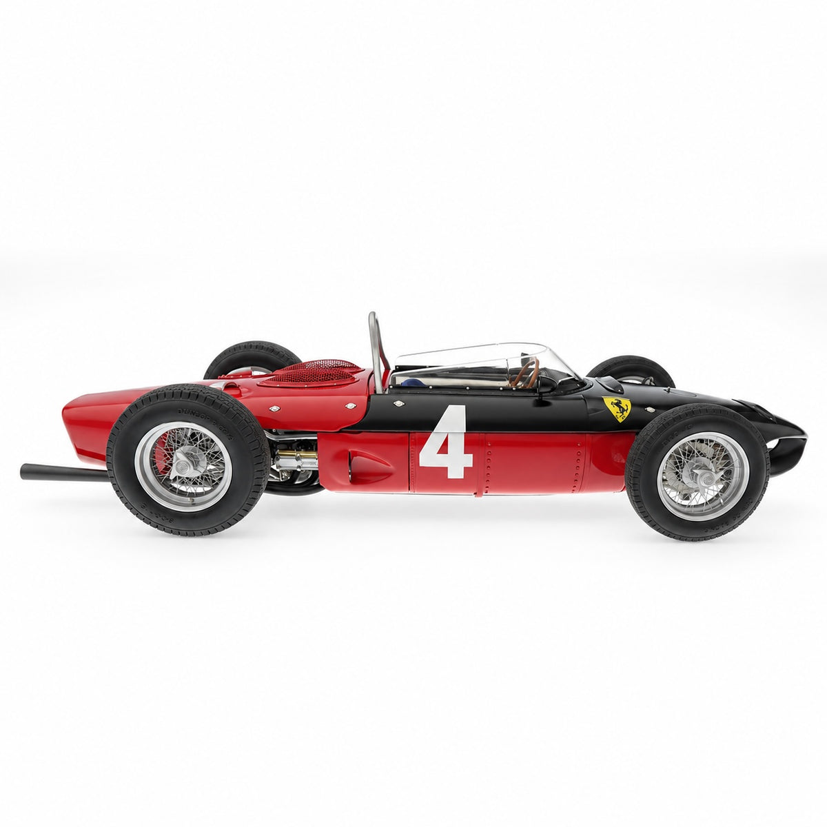 Redline Speed Diecast vintage Ferrari Formula One race car model with red and black livery and number 4 decals.