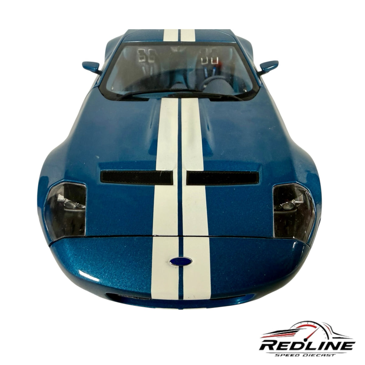 Redline Speed Diecast AUTOart Ford Shelby GR-1 concept car in metallic blue with white racing stripes, front view.