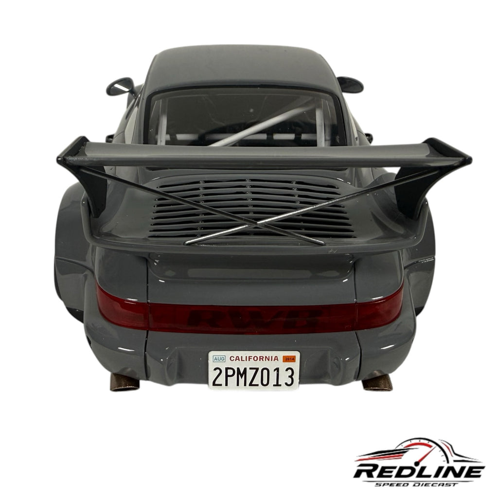Redline Speed Diecast 1:18 scale grey RWB Porsche model car featuring a wide-body kit and large rear wing, rear view.