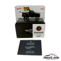 Redline Speed Diecast Hot Wheels Evan Mock 1987 Toyota Pickup in black with surfboard and flag in display case