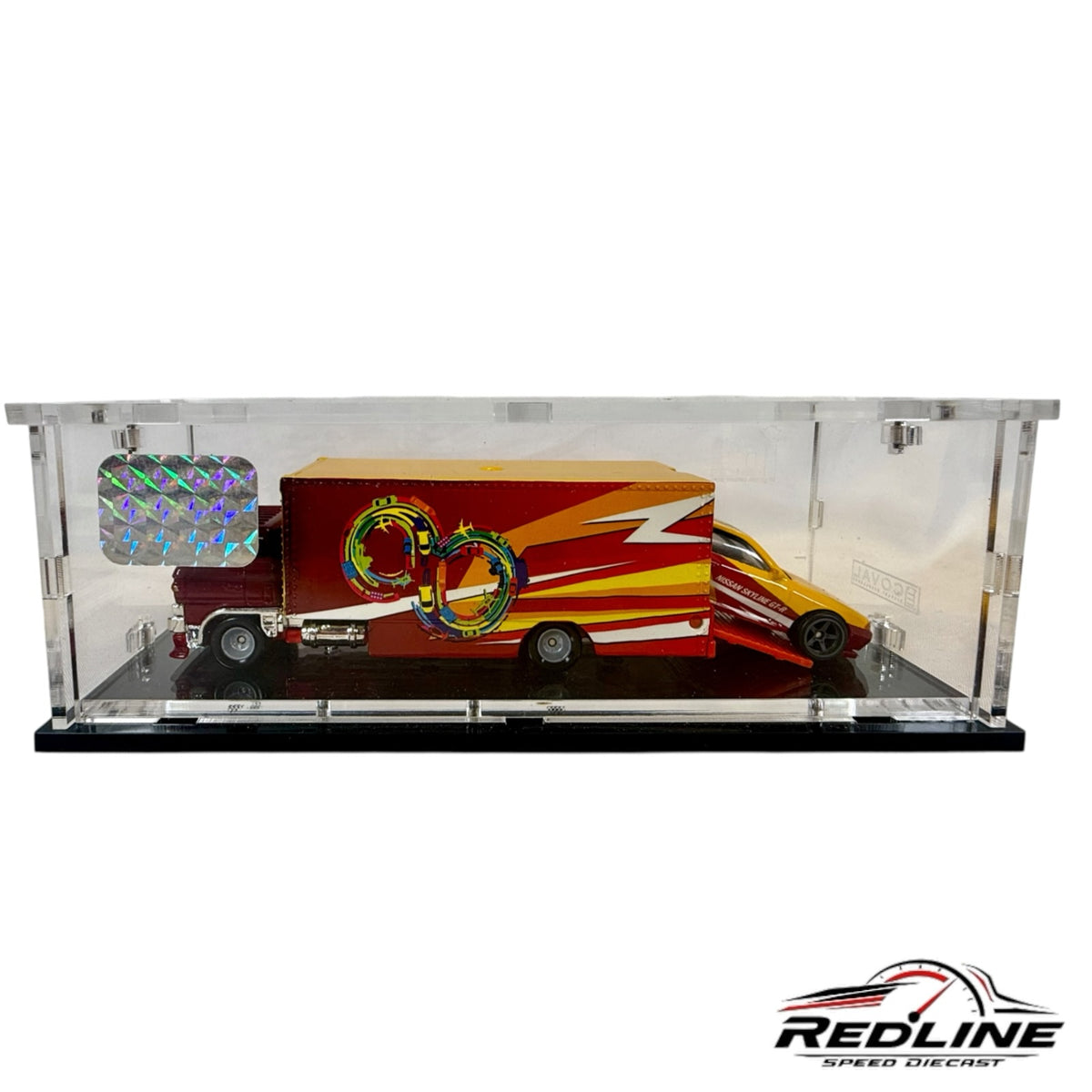 Redline Speed Diecast exclusive IDE hauler and Nissan Skyline GT-R set in a clear acrylic display case.
