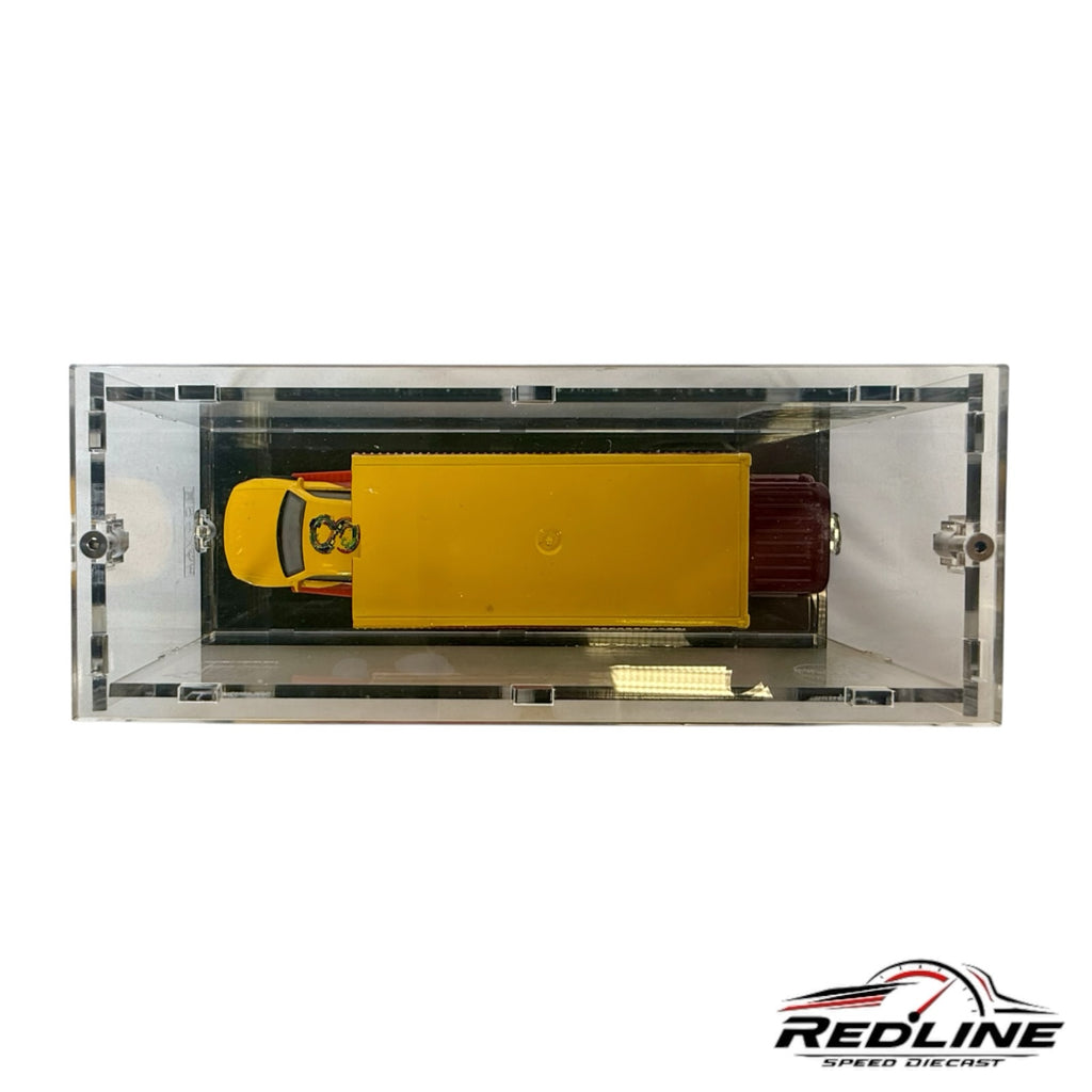 Redline Speed Diecast exclusive Indonesia Diecast Expo hauler and Nissan Skyline GT-R set in a clear acrylic case.