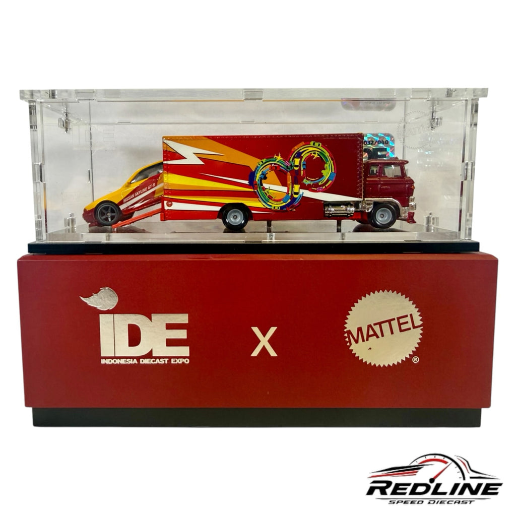 Redline Speed Diecast Indonesia Diecast Expo exclusive Nissan Skyline GT-R and hauler set in an acrylic display case.
