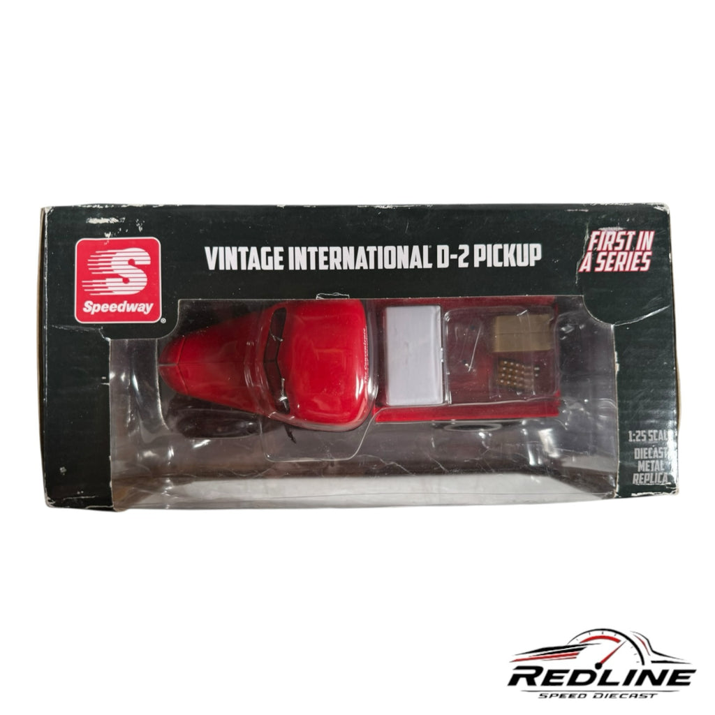 Redline Speed Diecast 1:25 scale red International D-2 pickup truck model in original packaging with cargo accessories