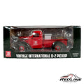 Redline Speed Diecast 1:25 scale red International D-2 pickup truck model with Speedway branding in original packaging.