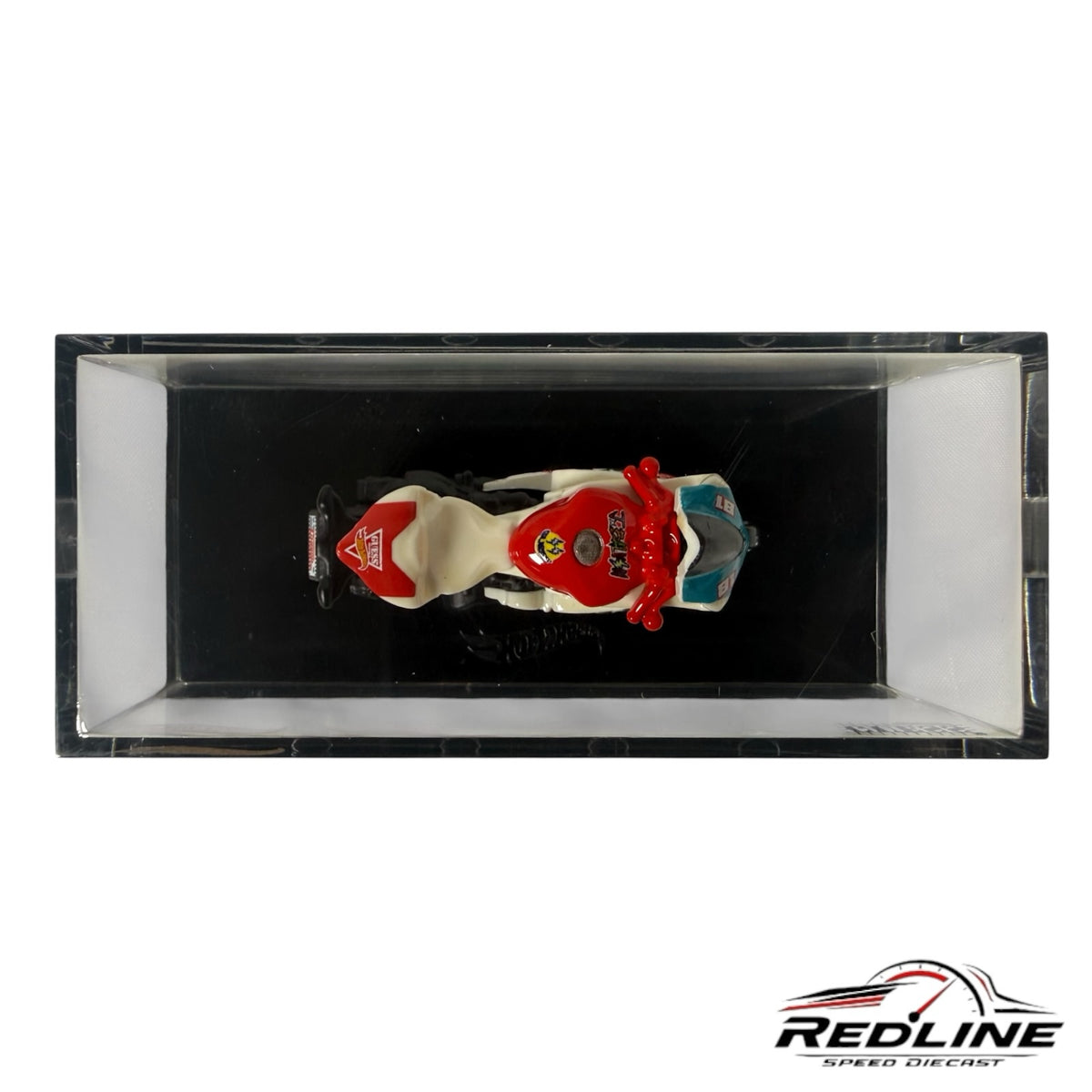 Redline Speed Diecast Hot Wheels J Balvin Ducati motorcycle in white and red with vibrant graphics in display case