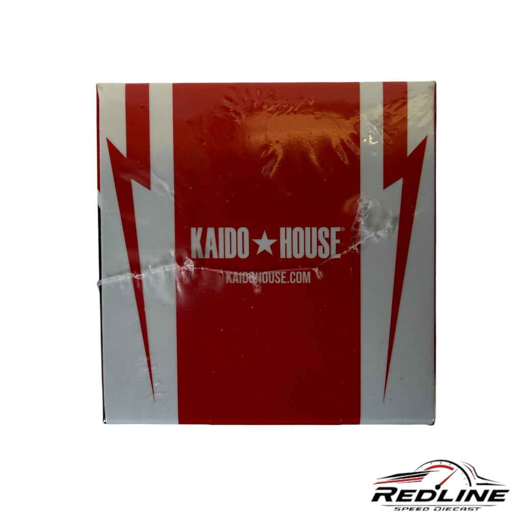 Redline Speed Diecast packaging for Kaido House Nissan Skyline model featuring white and red lightning bolt graphics.