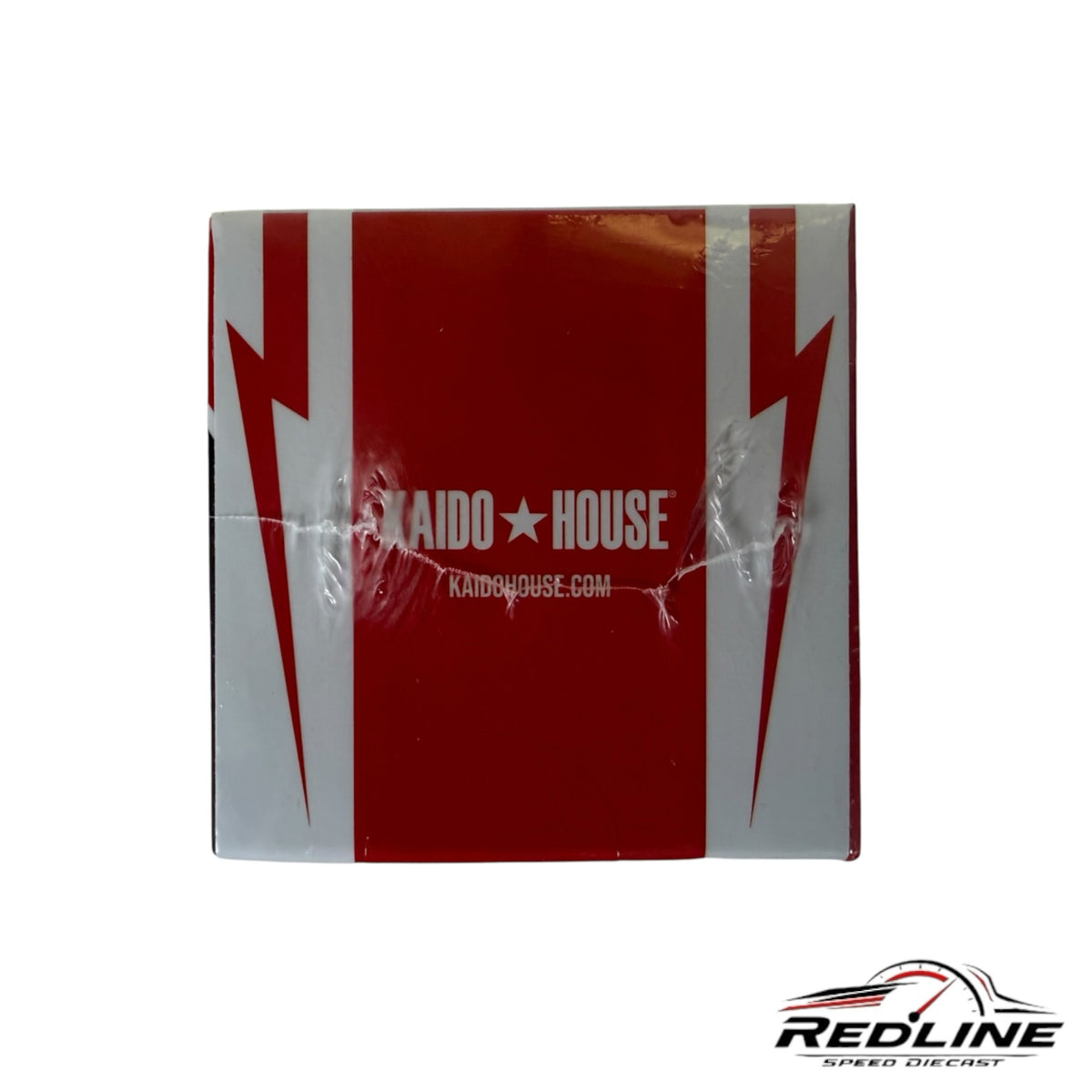 Redline Speed Diecast Kaido House Nissan Skyline model car packaging in red and white with lightning bolt graphics