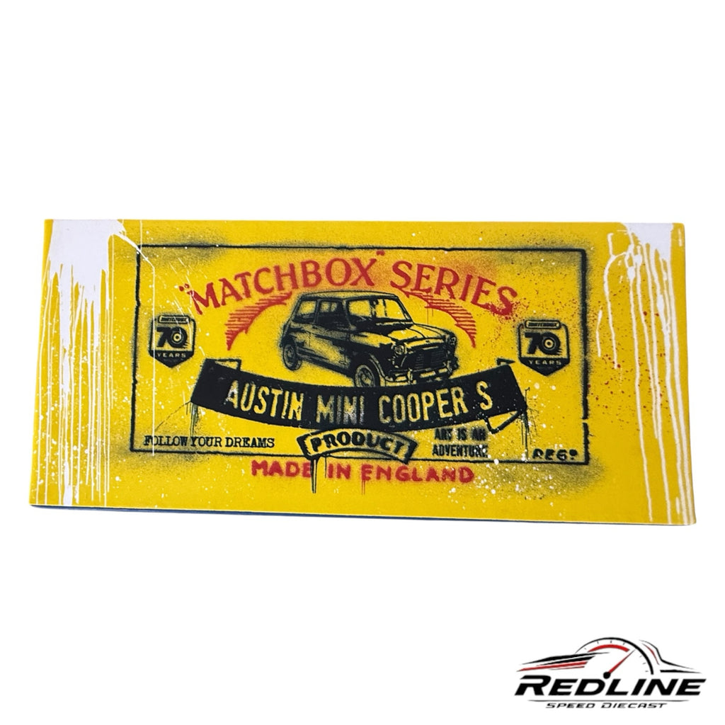 Redline Speed Diecast Matchbox Mr. Brainwash Austin Mini Cooper S collector box featuring yellow graffiti art design