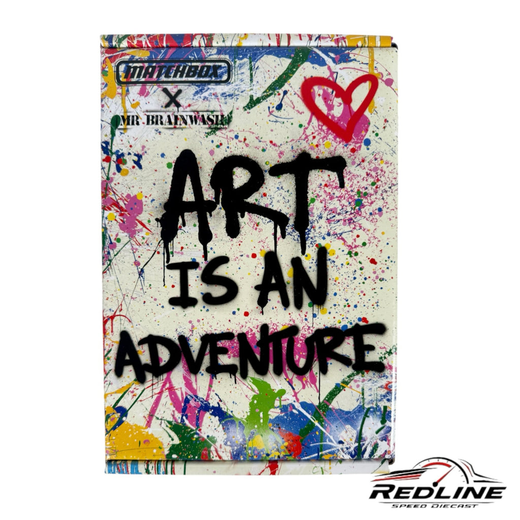 Redline Speed Diecast Matchbox Mr. Brainwash collector box featuring colorful paint splatters and graffiti text