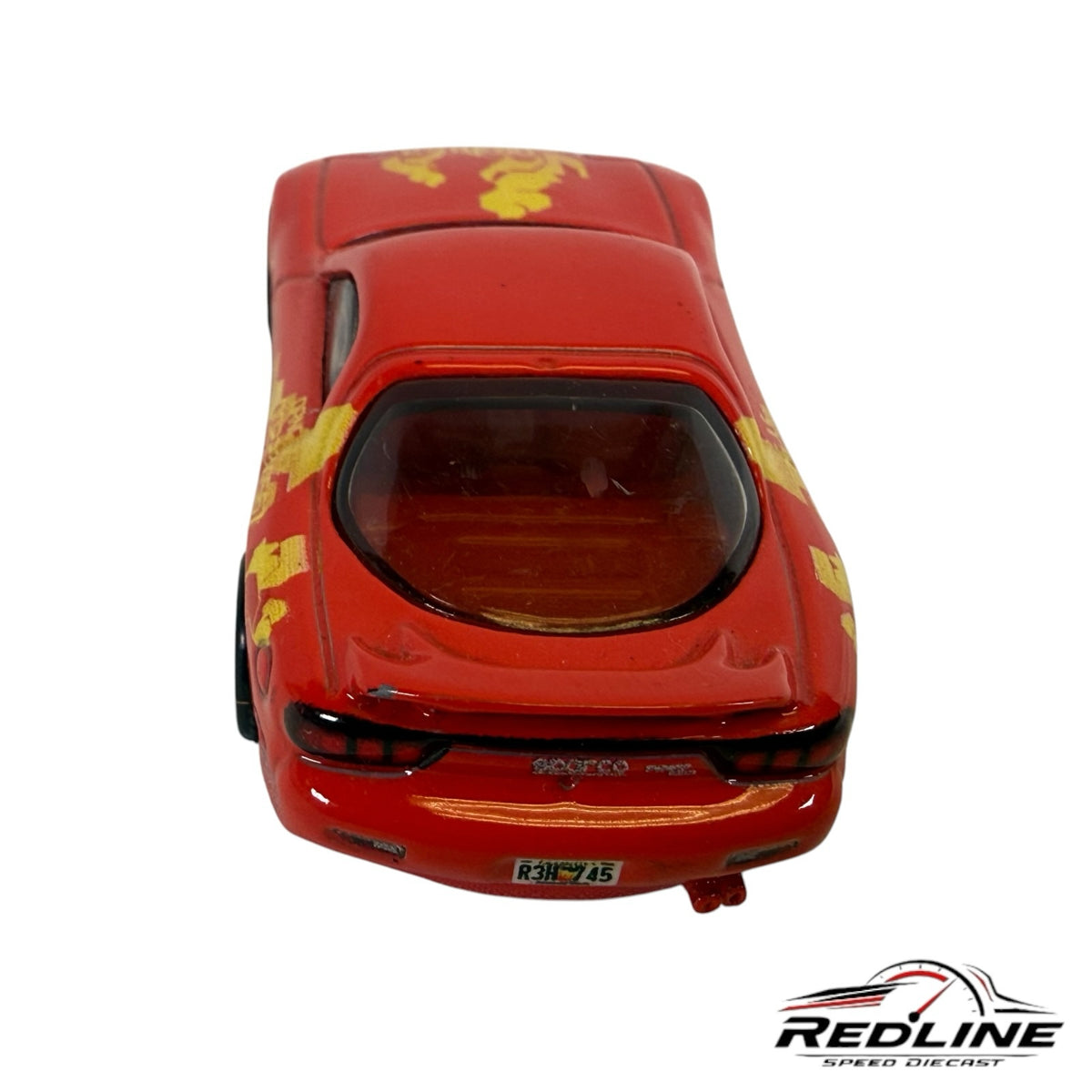 Redline Speed Diecast 1995 Mazda RX-7 die-cast model in red with yellow racing decals and rear spoiler, rear view