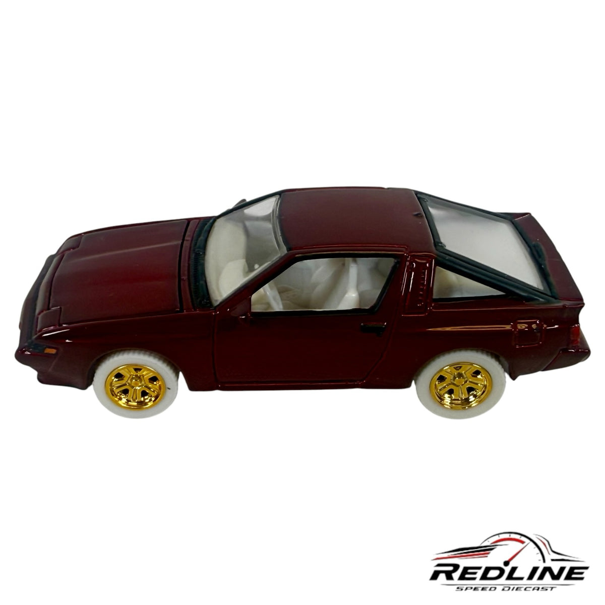 Redline Speed Diecast 1:64 scale metallic maroon Mitsubishi Starion model car with gold wheels and white-wall tires.
