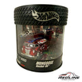 Redline Speed Diecast Hot Wheels Mongoose Rocket Oil drag racing vehicle in a tire-shaped display case