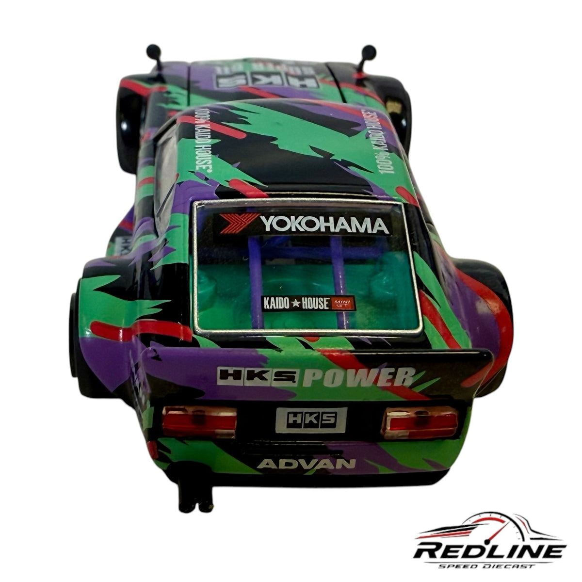 Redline Speed Diecast 1:64 Nissan Fairlady Z HKS V1 model with vibrant multi-colored racing livery and wide-body kit