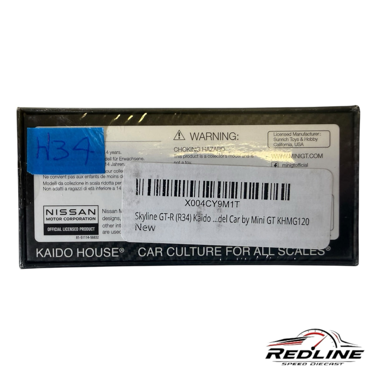 Redline Speed Diecast packaging box for the Kaido House Nissan Skyline GT-R R34 model car with warning labels