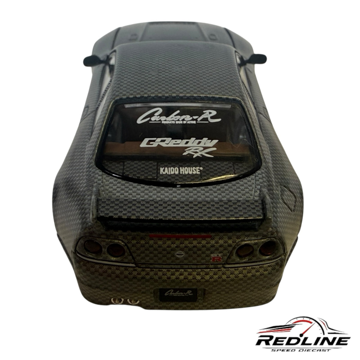 Redline Speed Diecast Kaido House Nissan Skyline GT-R R33 model with a full carbon fiber finish and rear racing decals
