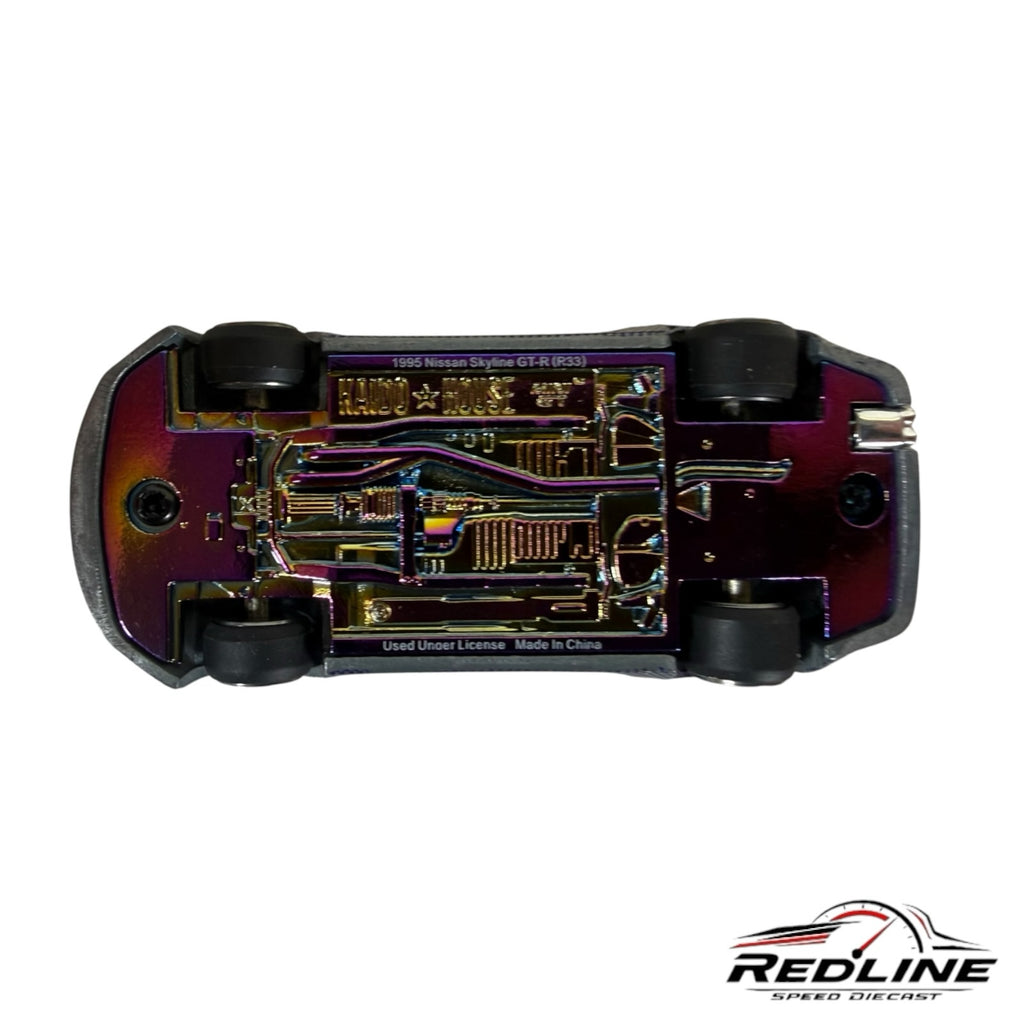 Redline Speed Diecast KAIDO HOUSE Nissan Skyline GT-R R33 model car showing the iridescent chassis and undercarriage
