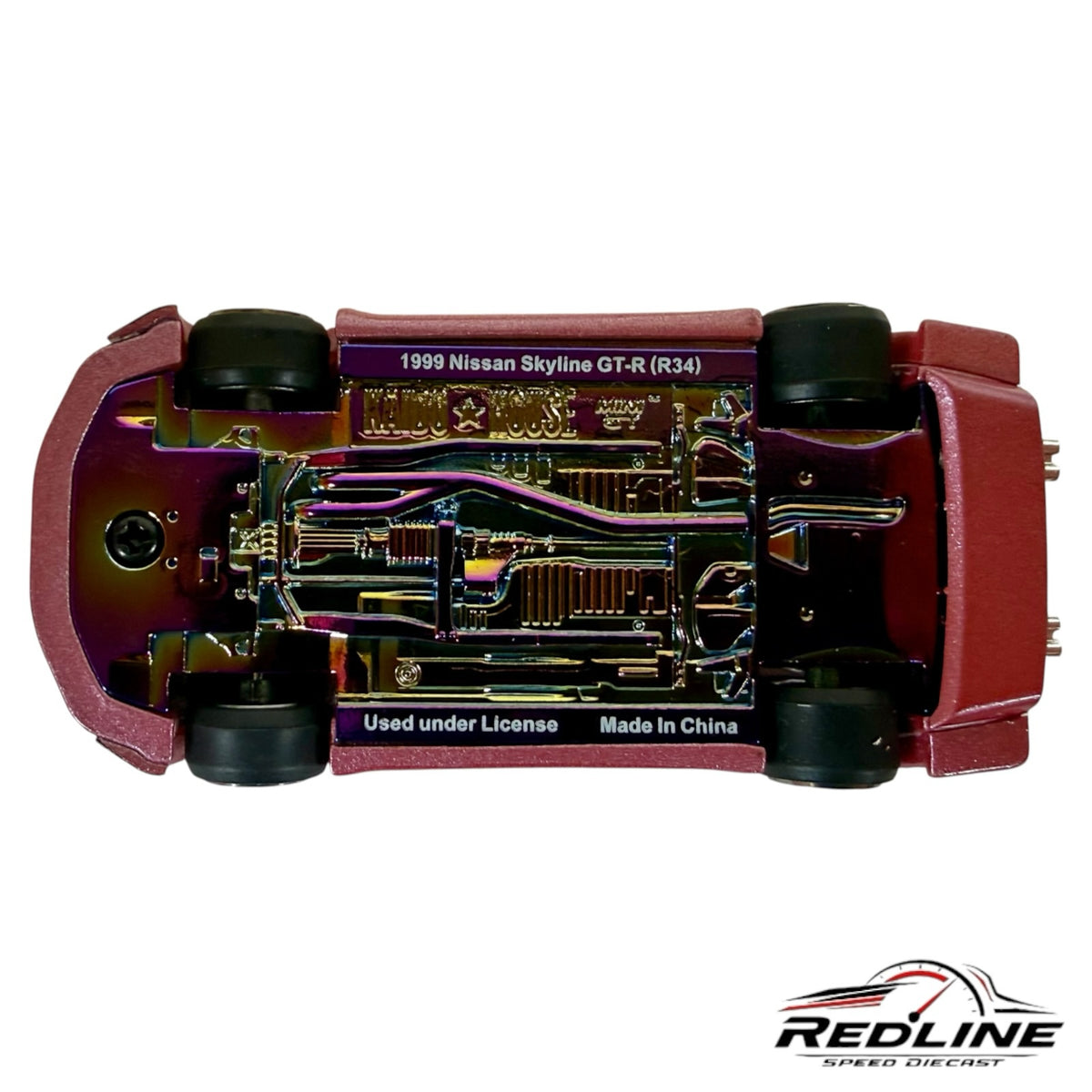 Redline Speed Diecast Kaido House Nissan Skyline GT-R R34 model showing the iridescent metallic chassis underside