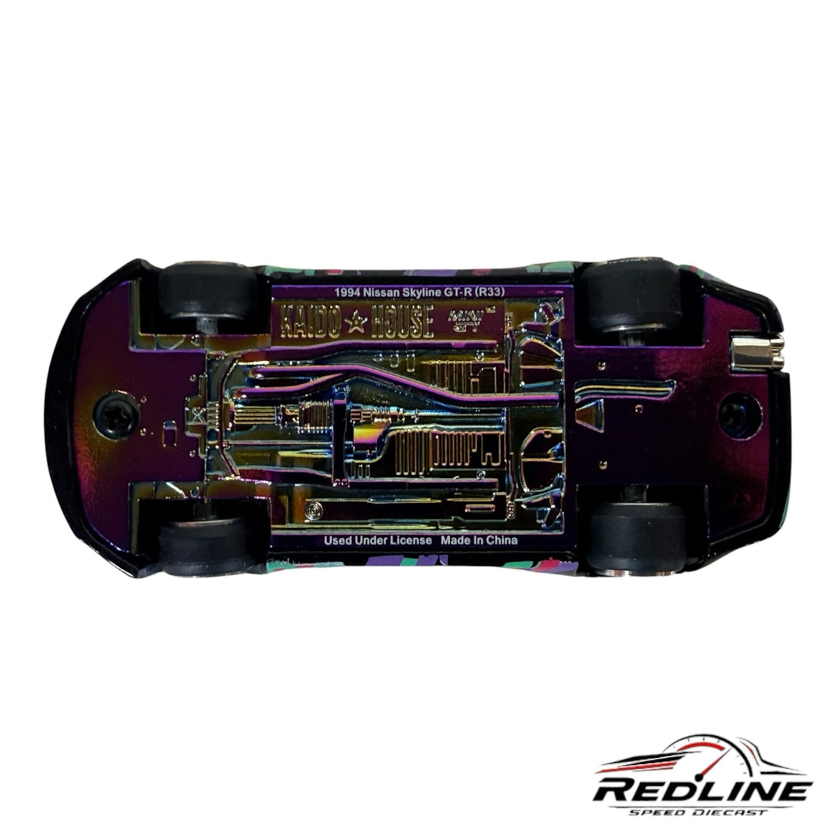 Redline Speed Diecast KAIDO HOUSE Nissan Skyline GT-R R33 model car showing the iridescent metallic chassis underside