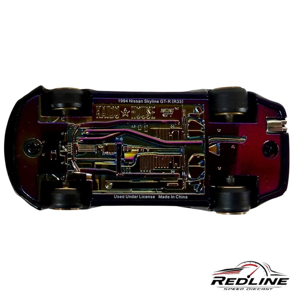 Redline Speed Diecast 1:64 scale Nissan Skyline GT-R R33 model car showing the iridescent chassis and detailed base.