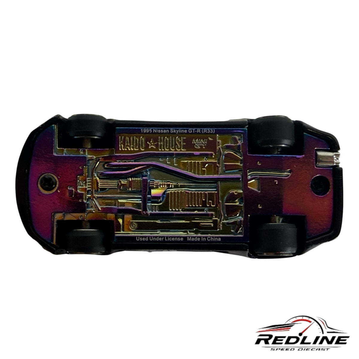 Redline Speed Diecast KAIDO HOUSE Nissan Skyline GT-R R33 model car showing the iridescent metallic chassis underside
