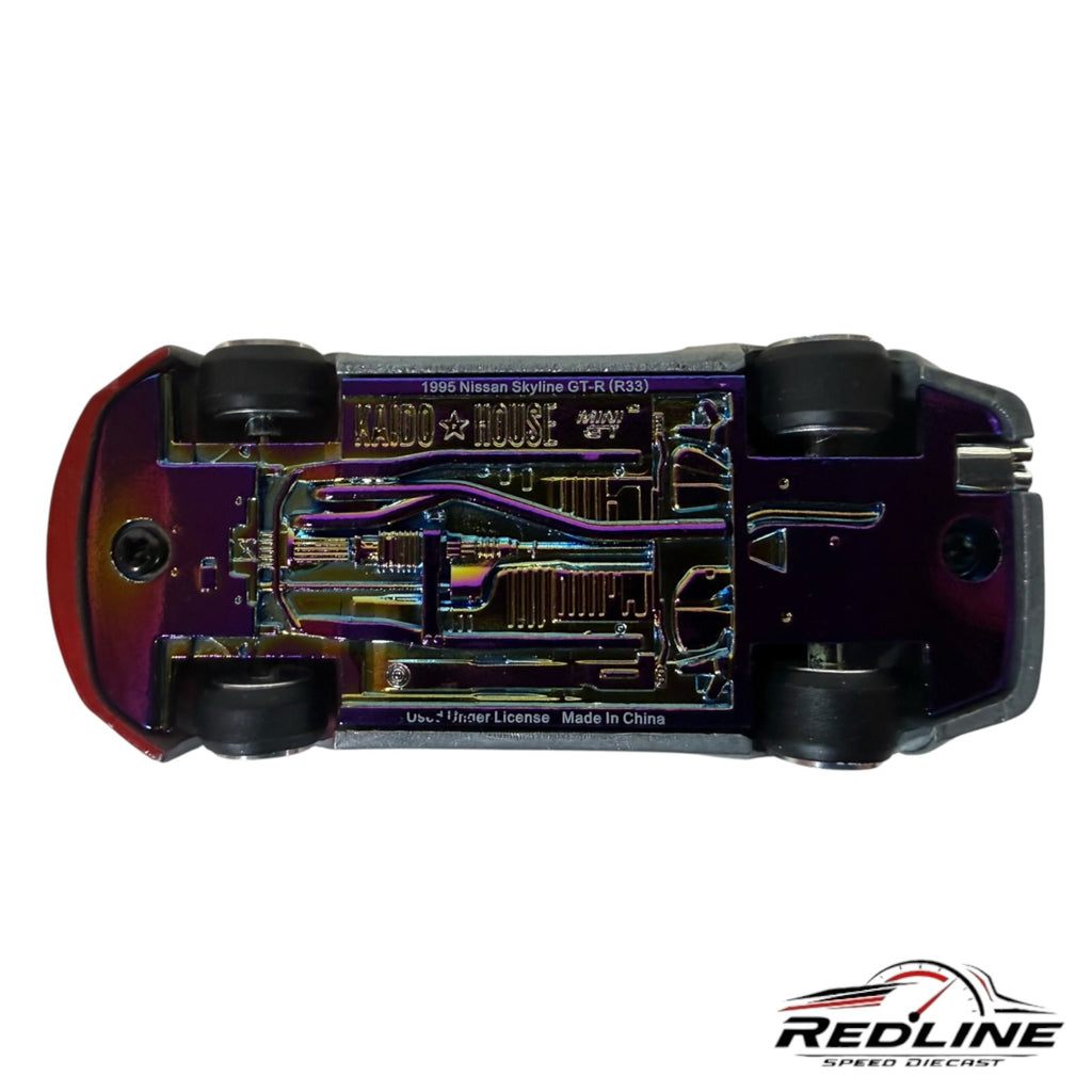 Redline Speed Diecast Nissan Skyline GT-R R33 model car showing the detailed iridescent metal chassis underside