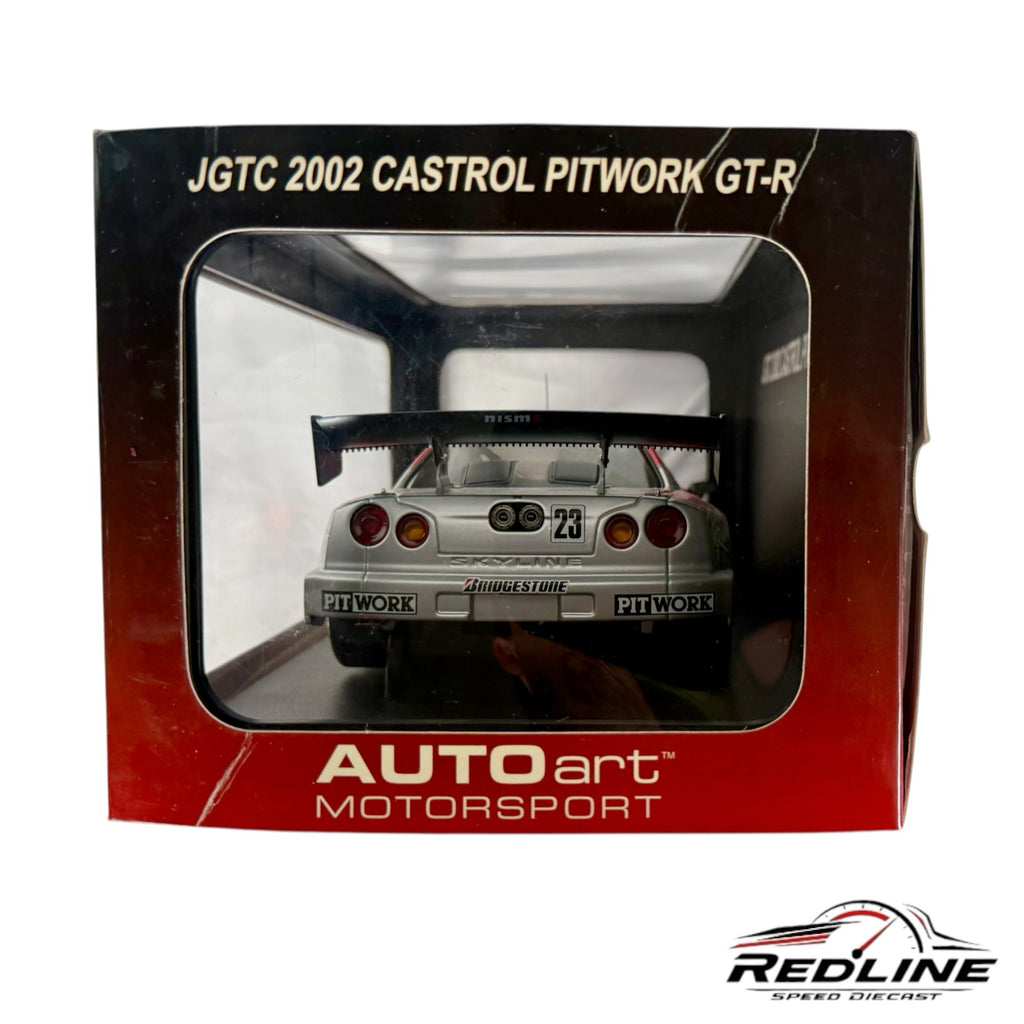 Redline Speed Diecast 1:18 scale AUTOart Nissan Skyline GT-R race car model in its original display box, rear view.