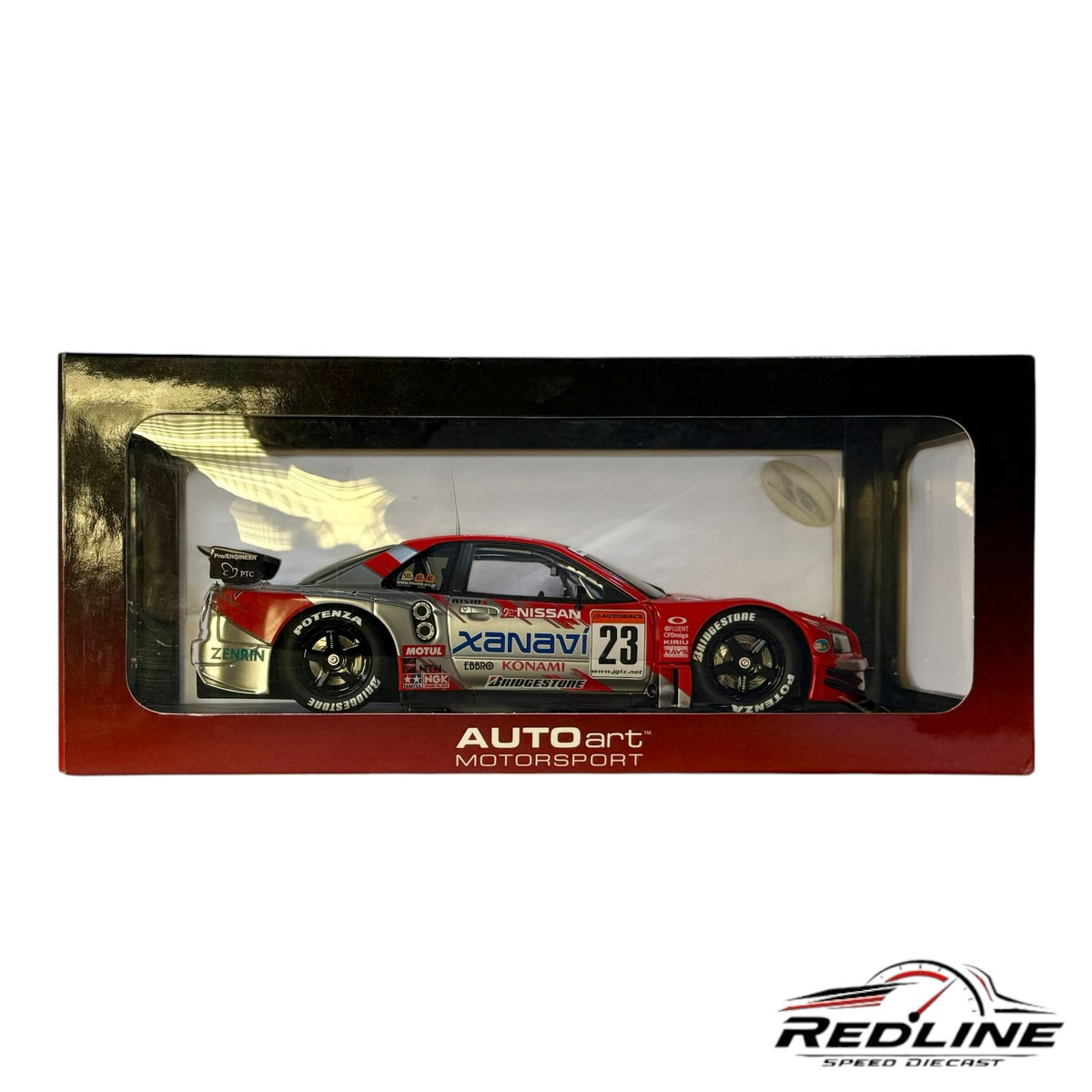 Redline Speed Diecast AUTOart 1:18 scale Nissan Skyline GT-R Xanavi NISMO race car in red and silver display box