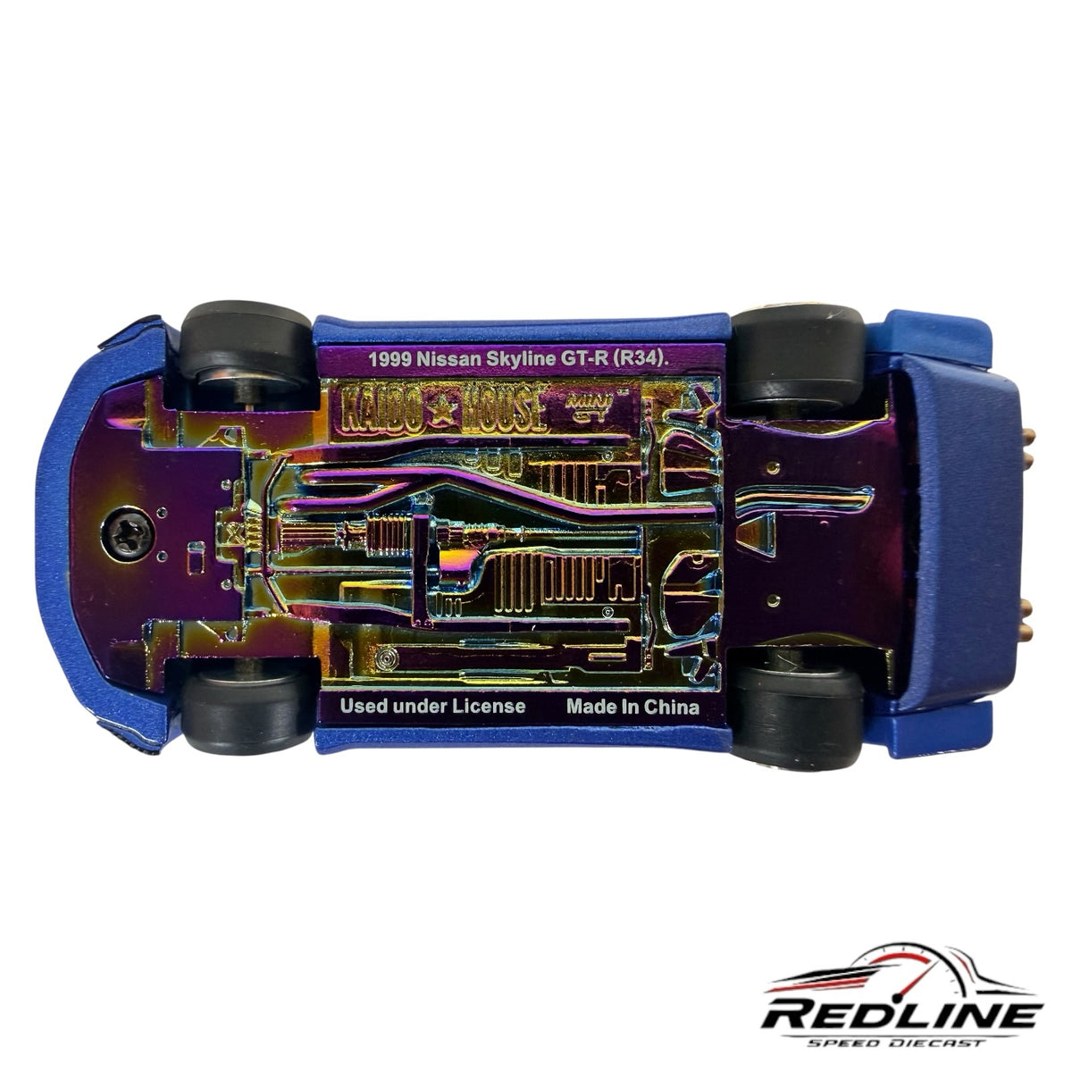 Redline Speed Diecast KAIDO HOUSE Nissan Skyline GT-R R34 model car showing the iridescent chassis and undercarriage