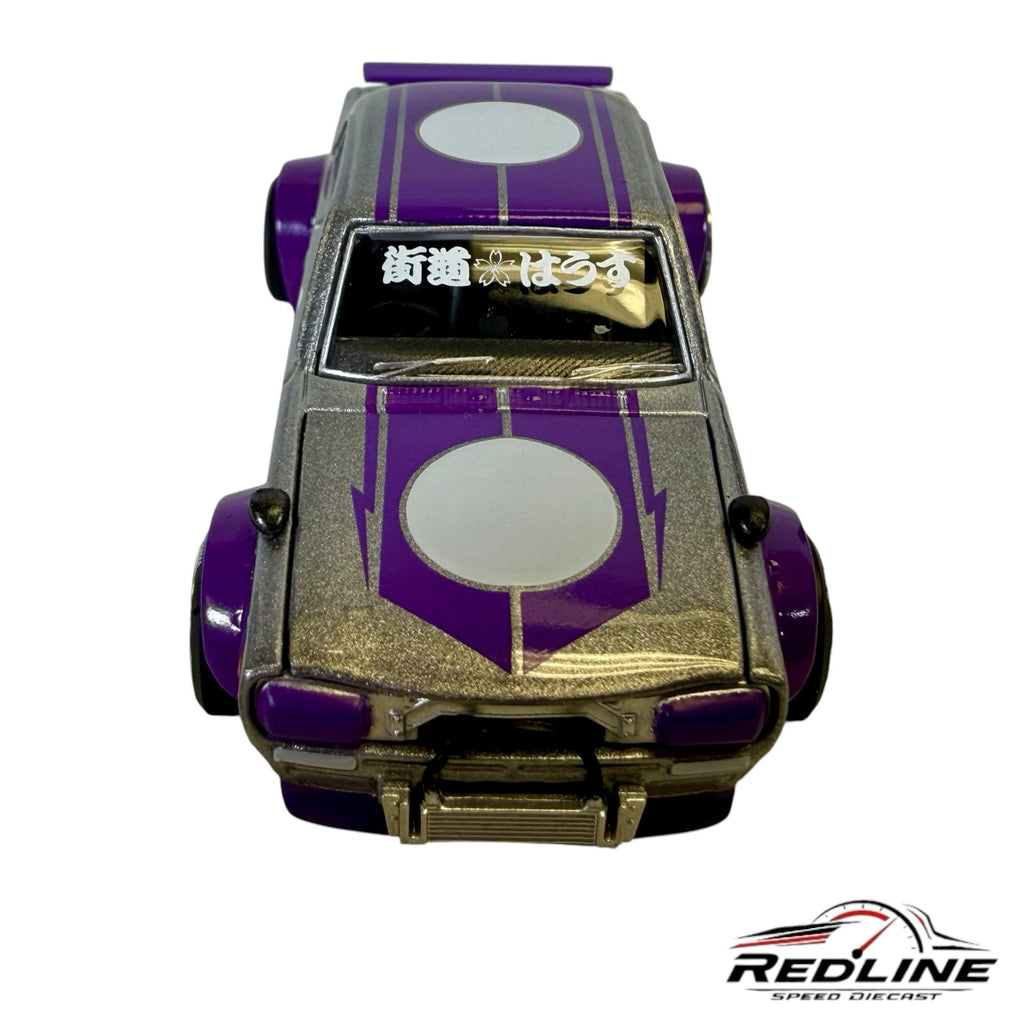 Redline Speed Diecast Nissan Skyline Kaido Works 1:64 scale model in silver and purple with wide-body stance