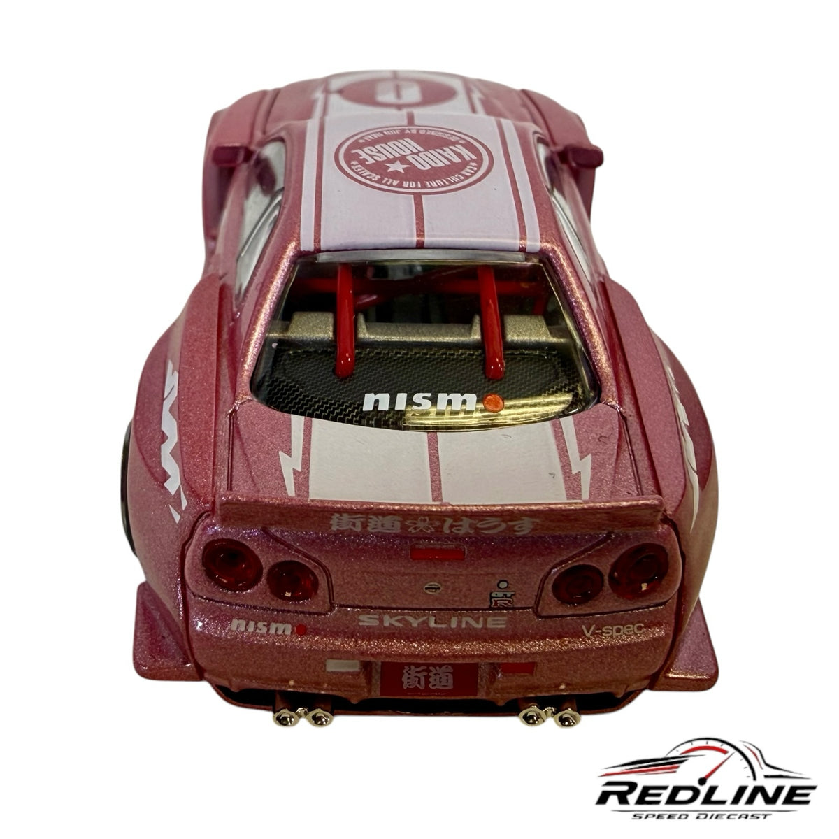 Redline Speed Diecast metallic pink Nissan Skyline GT-R R34 wide-body racing model with custom decals and roll cage