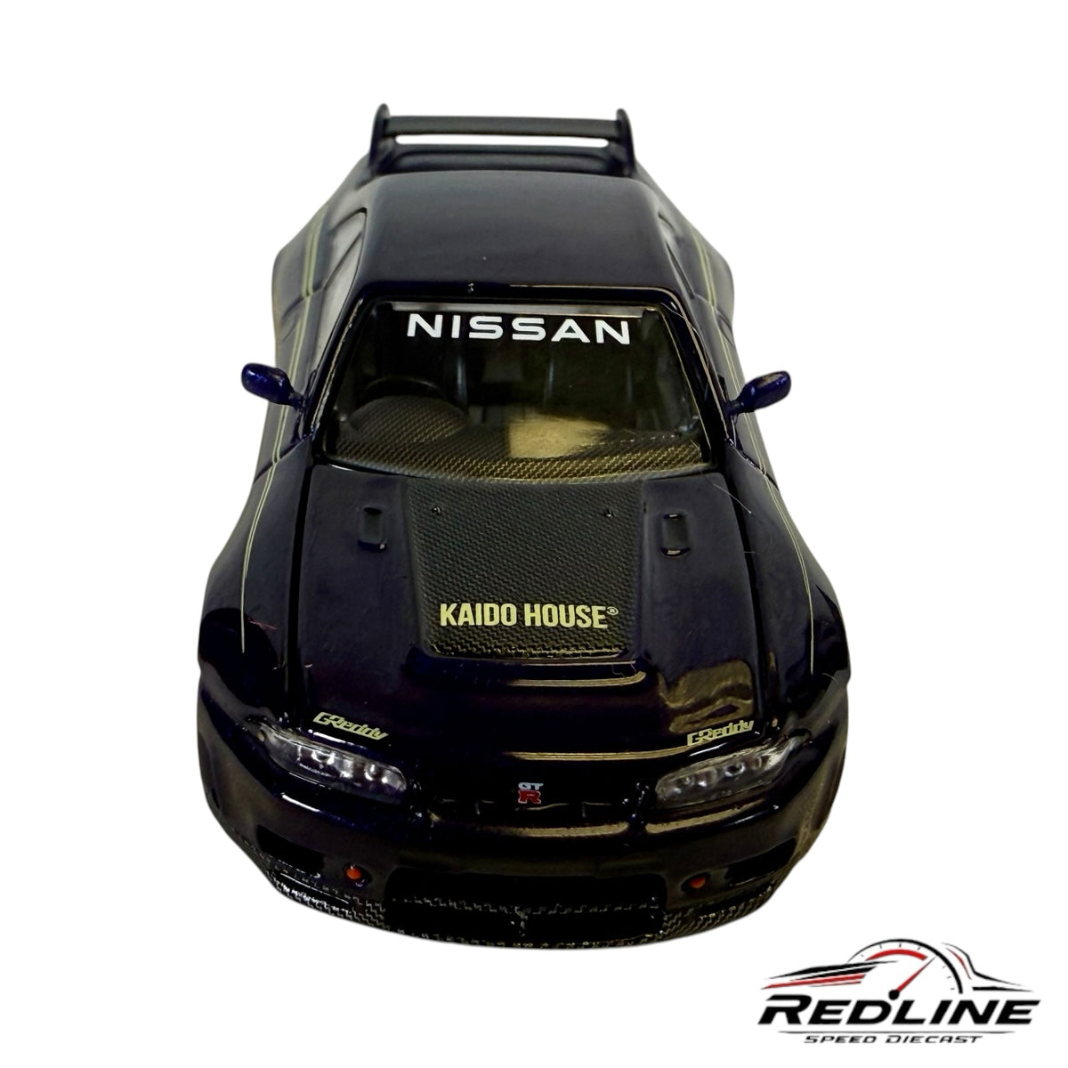 Redline Speed Diecast 1:64 scale purple Nissan Skyline GT-R R33 Kaido Works model with carbon-look hood and branding.