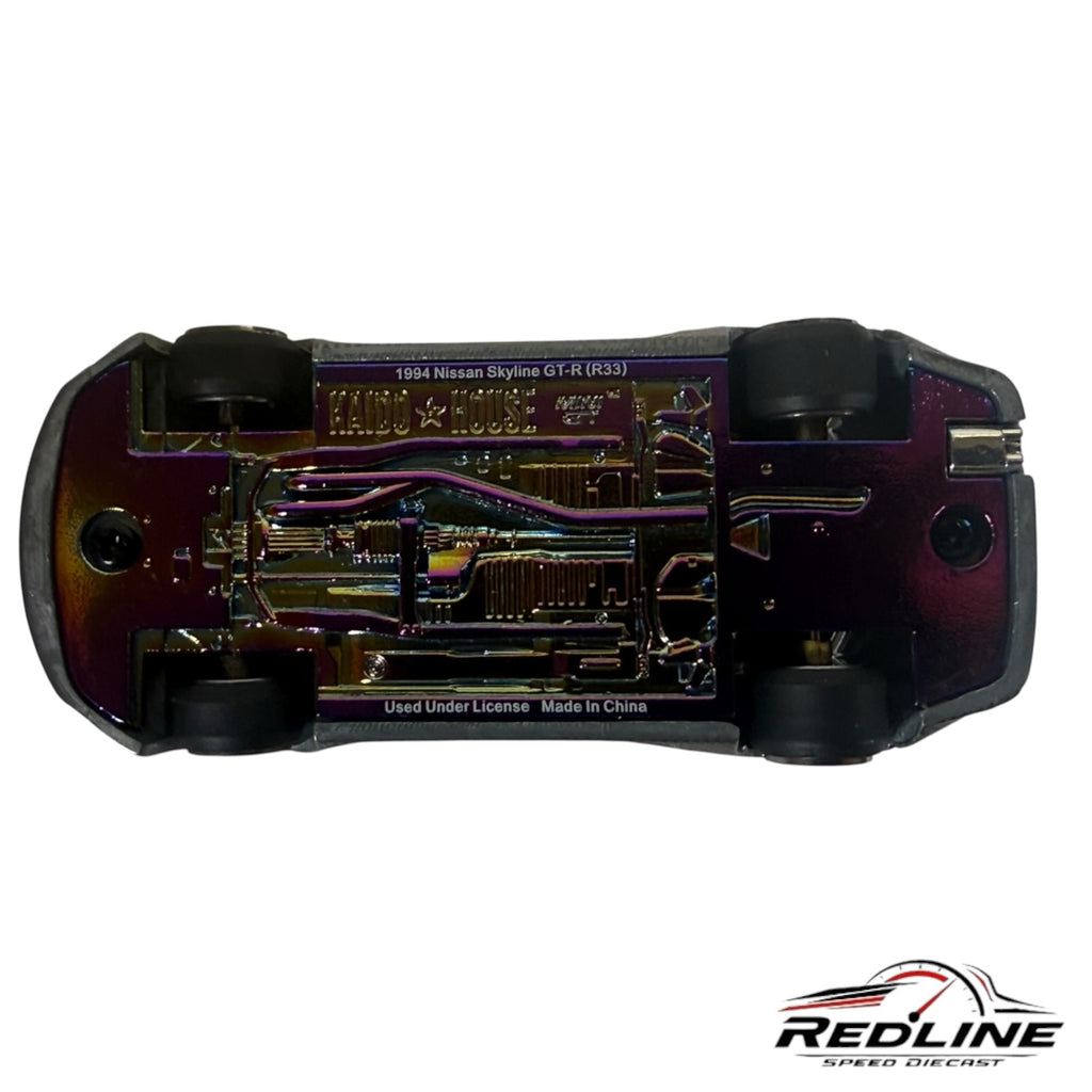 Redline Speed Diecast 1:64 scale Nissan Skyline GT-R R33 model showing the iridescent metallic undercarriage detail