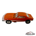 Redline Speed Diecast 1967 orange Chevrolet Camaro muscle car model with white side detailing and chrome wheels