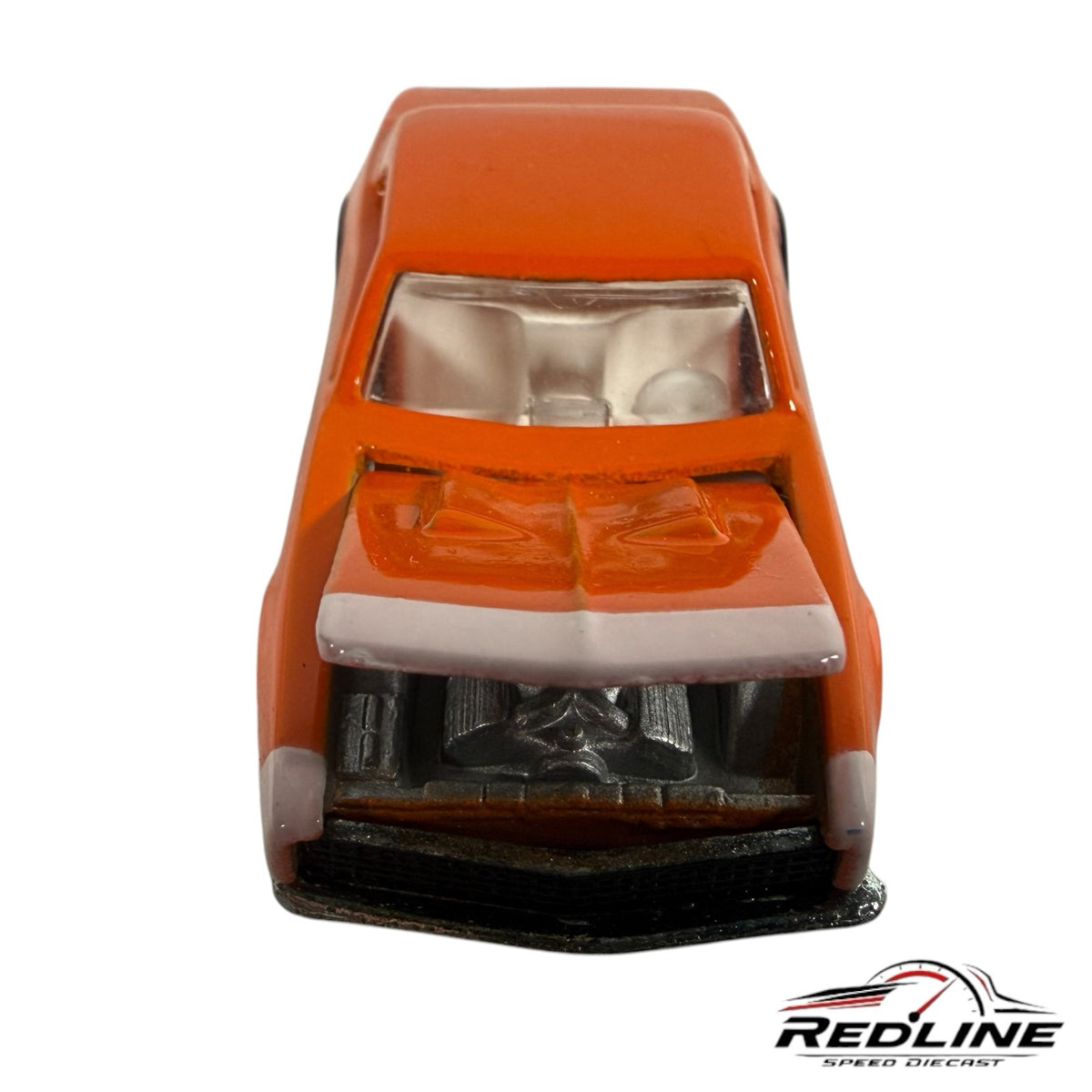 Redline Speed Diecast 1967 Chevrolet Camaro model in orange with an open hood revealing a detailed engine bay