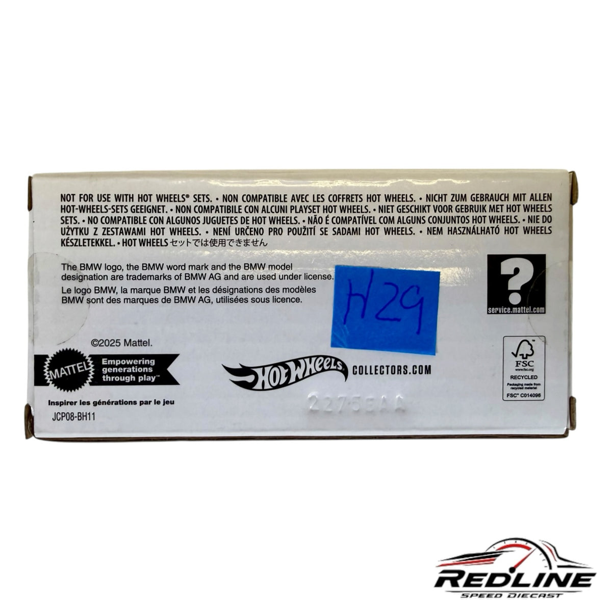 Redline Speed Diecast packaging box bottom with safety warnings and Hot Wheels branding