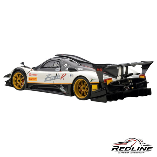 Redline Speed Diecast Pagani Zonda R model car in white and carbon fiber with gold wheels and racing livery.