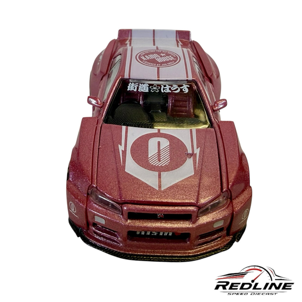 Redline Speed Diecast metallic pink Nissan Skyline GT-R R34 wide-body racing model with custom decals